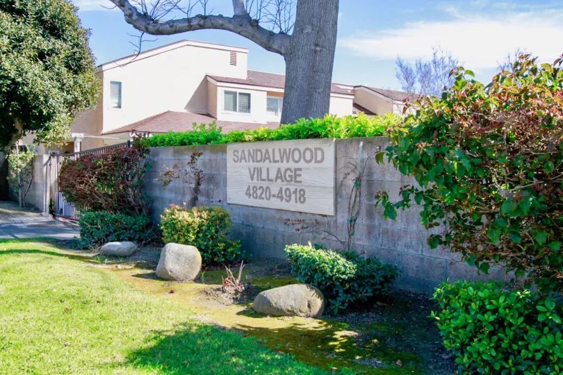 Sandalwood Village Santa Ana California natural beauty was found in this place with stones and plant climbing compound wall