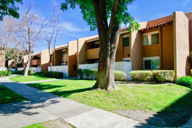 The row houses in South Coast Villas is having beautiful row houses and also with street full of trees and plants.