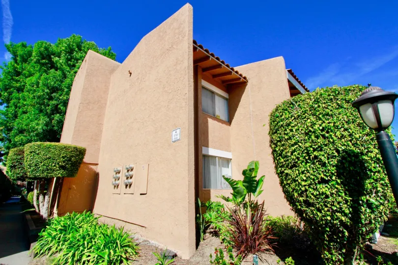 trees and plants around the building in South Coast Villas