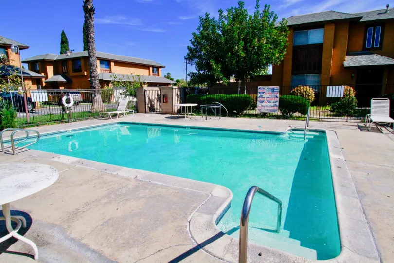 Outside swimming pool with clear water and sunshine