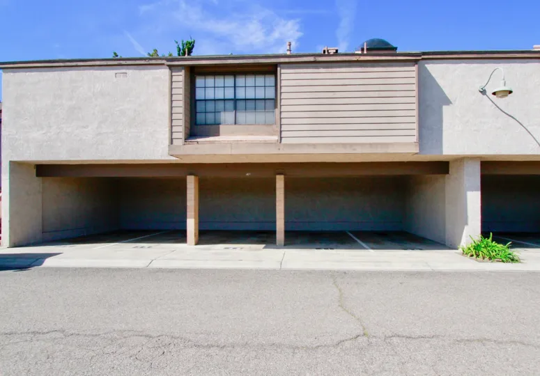 Under the Villa in Woodlake, parking facilities is available and light lamp is hanger in the wall