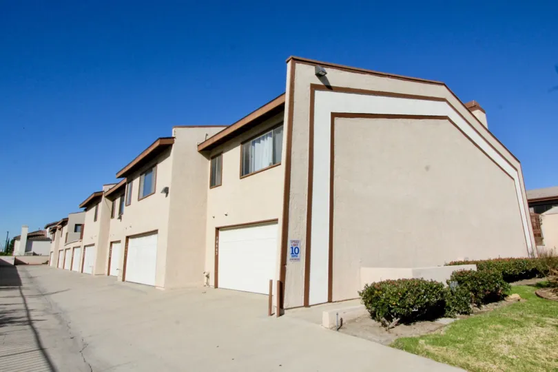 Two-storey townhouses with brown trimmings in the Bell Terrace community.
