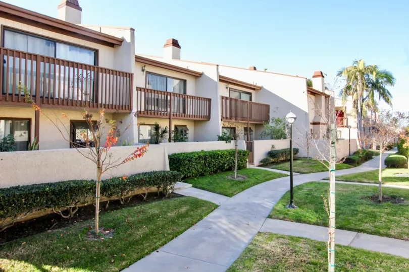 Largest floorplan in lovely Bell Terrace with 2 huge master suites, private baths and vaulted ceilings. Highlights include wood floors, custom fireplace, interior laundry, fresh paint throughout and direct access to a spacious 2 car garage. Kitchen featur