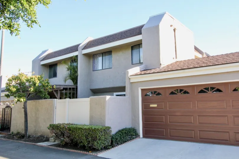 A car porch is situated nearby the house in the Stanton Park Townhomes.