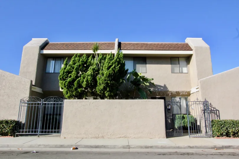 Gated entryways provide added security at the Stanton Park Townhomes with appealing landscaping
