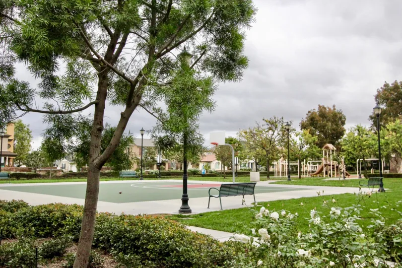 Park in the Camden Place community of Tustin, California complete with basketball court and playground equipment
