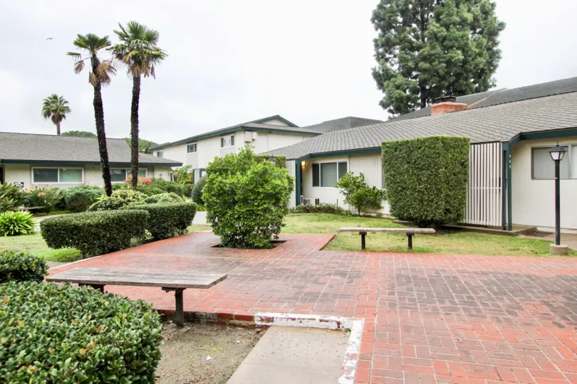 Green landscaping in the Palmwood Gardens community in Tustin, California.