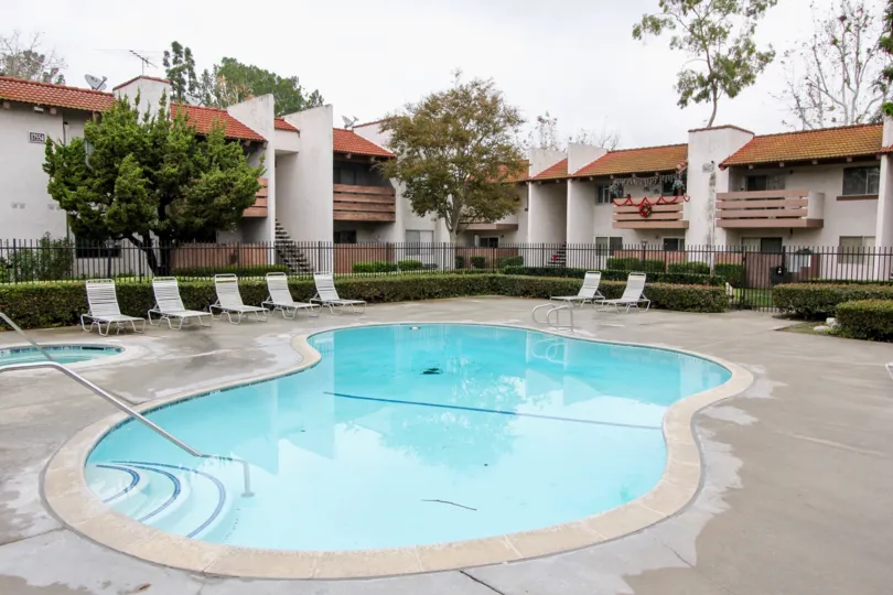 Beautiful swimming pool with sitting at centre of villas in Quail Meadows of Tustin
