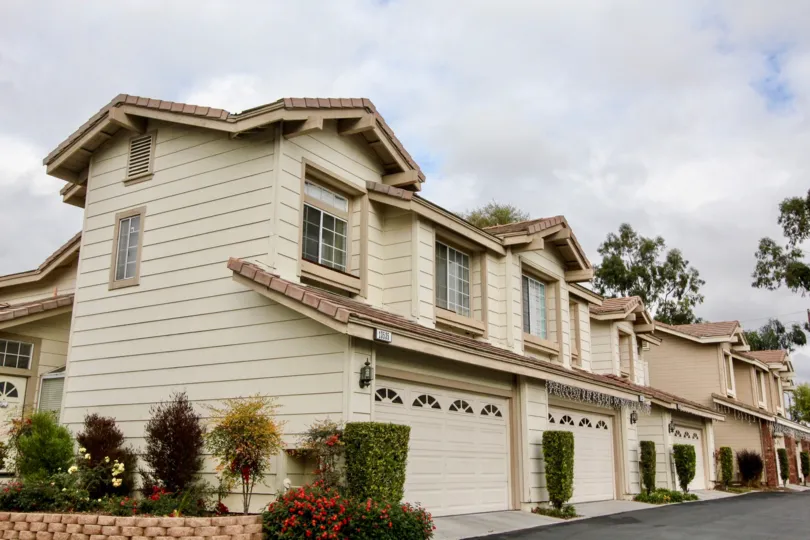 A plartly cloudy day outside of a house in Tustin, California