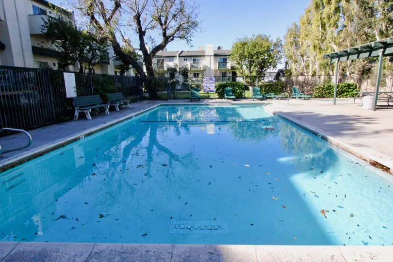Awesome swimming pool with trees around in Tustin Commons of Tustin