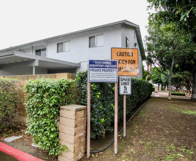 THE HOUSE IN THE TUSTIN IMPERIAL WITH THE PLANTS, TREES