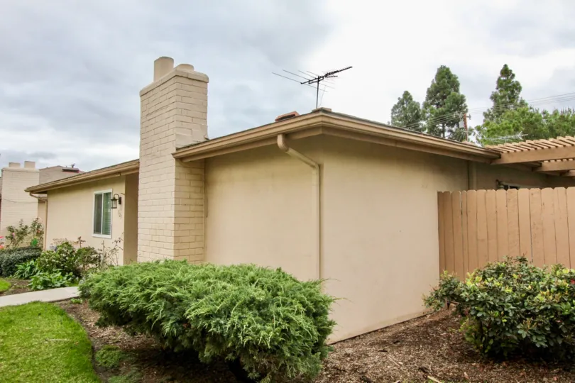 A wire television antennae sits on top of a house in Tustin Park Villas
