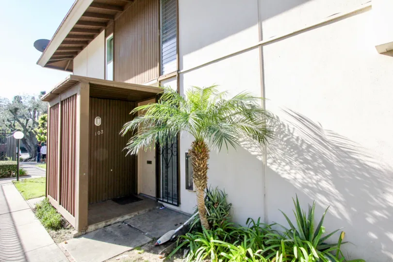 Awesome villa wtih entrance gate and small palm trees in Tustin Village of Tustin