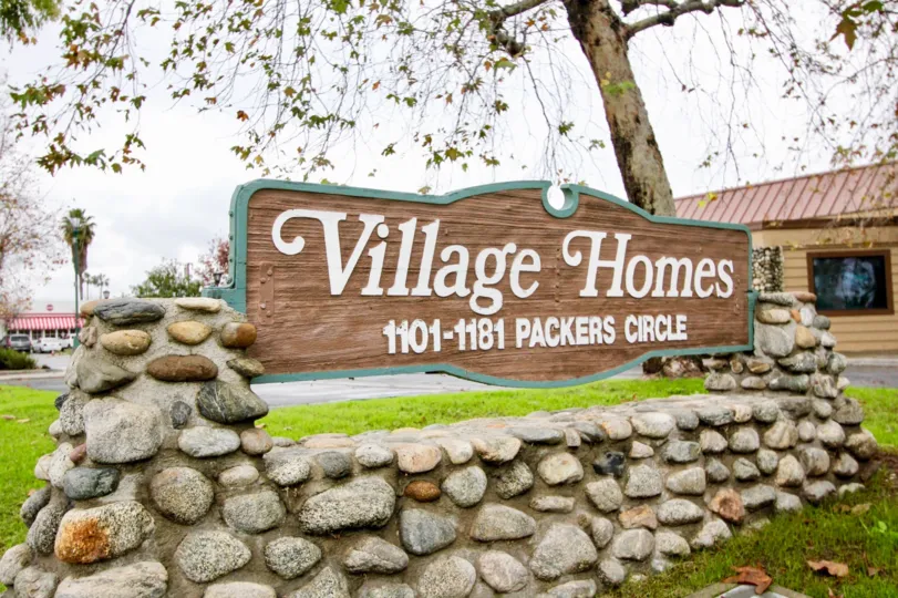 Attractive entrance adornment greets visitors at the Village Homes community