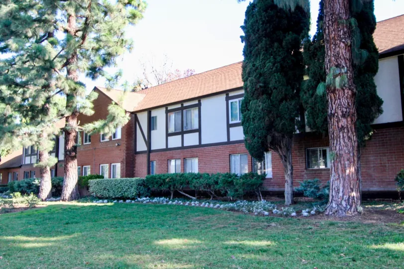 A two-storey townhouse with brick cladding in the Williamshire Condos neighborhood.