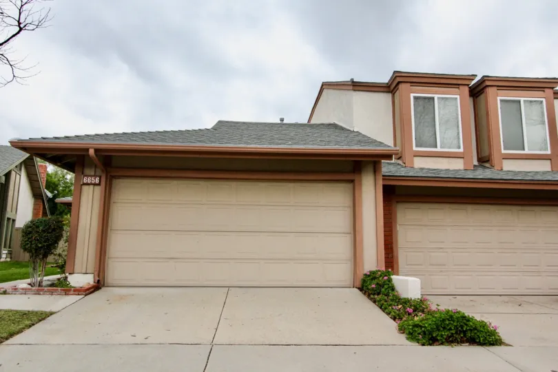 In 6656 villa in Charter Hill has car parking facility with shed and flowers on the bushes