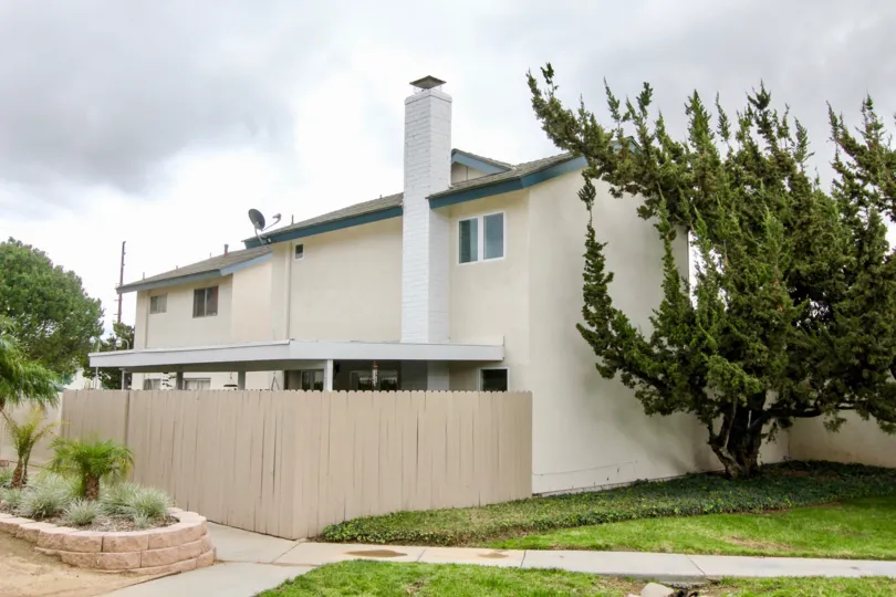 A cloudy day in the Fairgreen Homes nearby the house and tree.