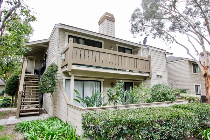 Two story building in Kellogg Terrace with a staircase and balconies.