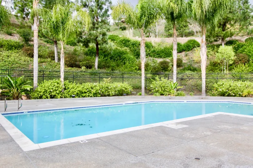 Pool side with beautiful greenery in La Terraza I community in Yorba Linda, California