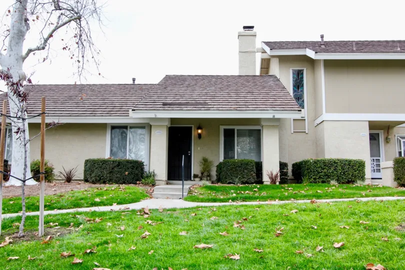 A beautiful day in the Rancho Dominguez Townhomes with a beautiful apartment and lawn.