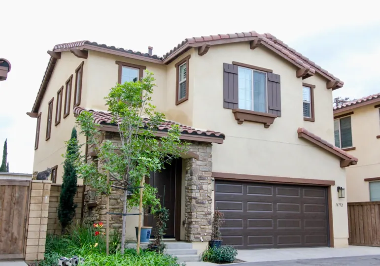 Tall house with brown windows in Rouse Court, Yorba Linda California