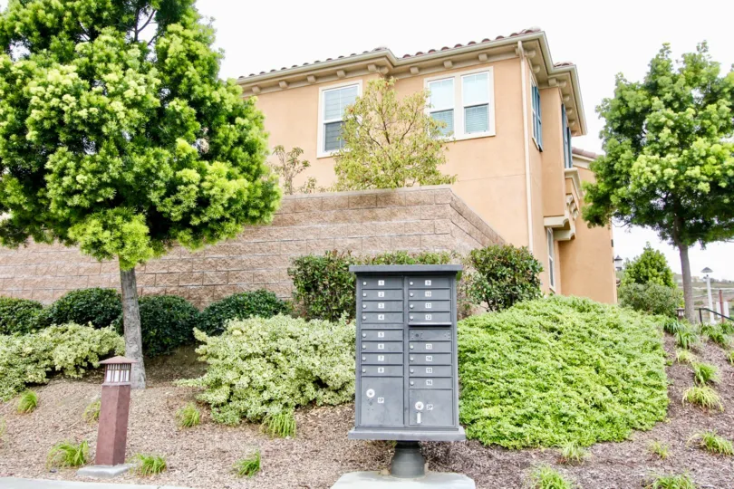 Villaggio Yorba Linda California like hill station building with thick trees and iron box models in front