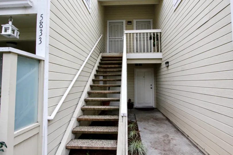 The 5833 villa in Yorba Linda Villages has a single stair way for two villa which is closer to each other