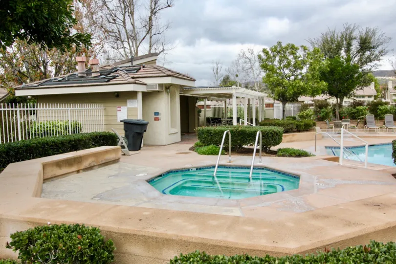 Inside the villa in Yorba Meadowood has swimming pool for both adults and children with dustbin box and cutting bushes
