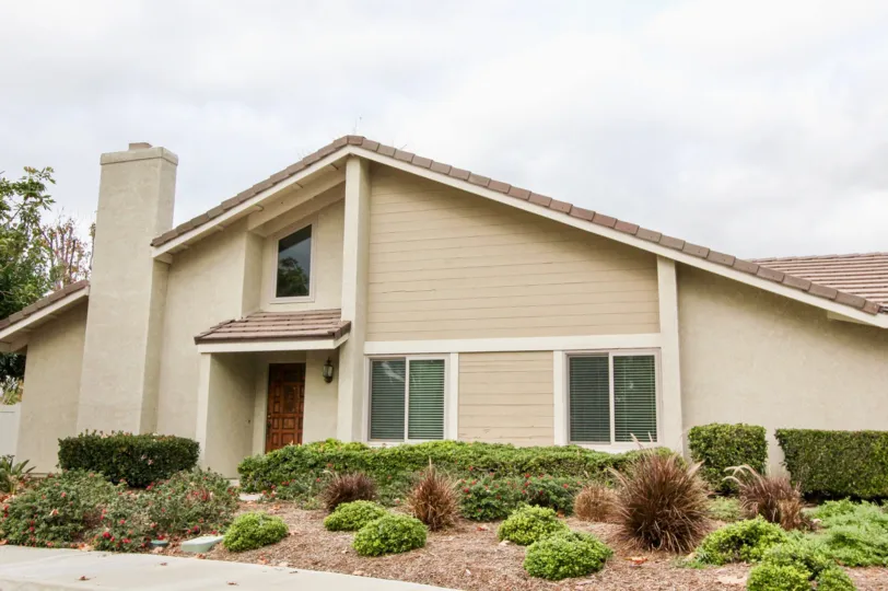 A verity house in the Yorba Meadowood with beautiful plants.