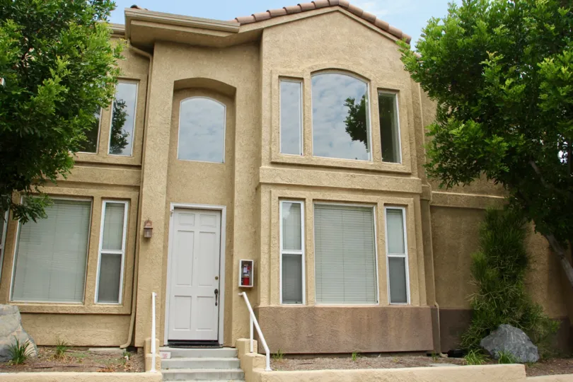 Altia corona California most front part of building covered with lengthy doors and windows with cute plain clear glass