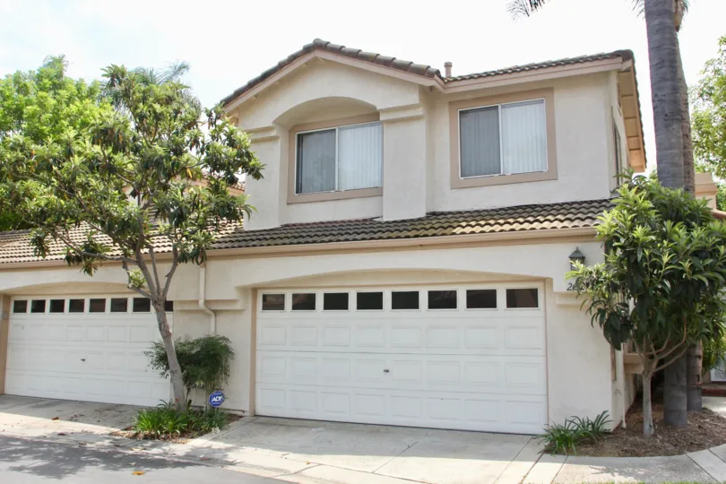 Double garage with professional landscaping at this townhouse
