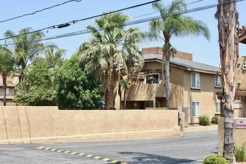 Power lines run above a driveway in the Gianni Villas.