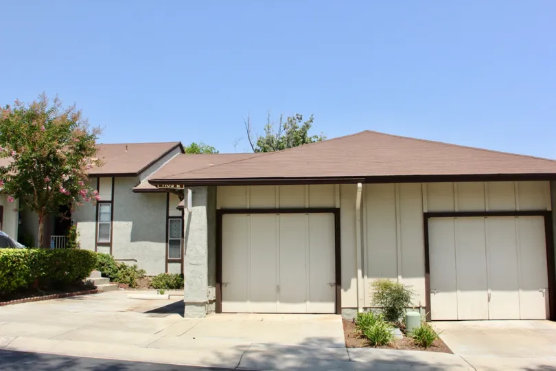 Garage doors at Laurelwood with street access and nice landscaping