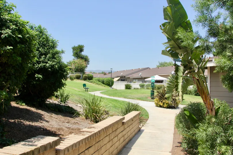 This pet friendly community is located in Corona, California, in the Magnolia Glen Community, It features great view of surrounding areas. and a great walking path. There is beautiful plants to view also.