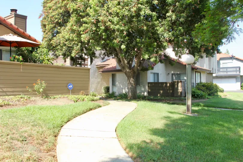 A path winds to the house in the Oakview homes in Corona.