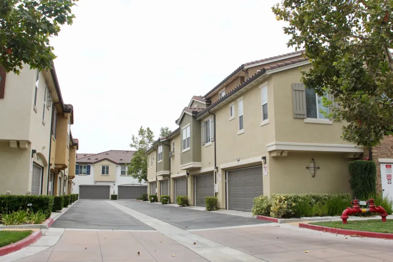 Leaves sits on the driveway in front of condo's at the Serafina.