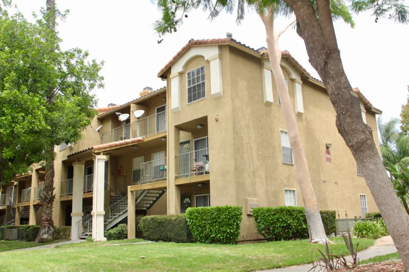 Three satellite dishes sit on balconies on the third floor at the Sienna village.