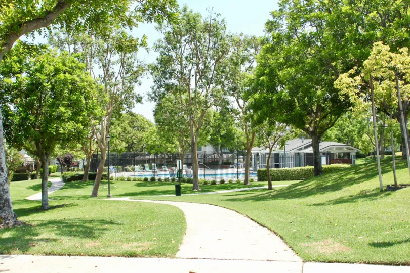 In ground swimming pool and clubhouse on a beautiful day in the Gallery community of Corona, CA.
