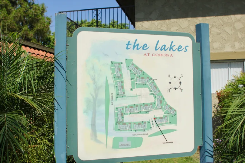 Close up view of the sign with map of The Lakes at Corona community in Corona, CA.