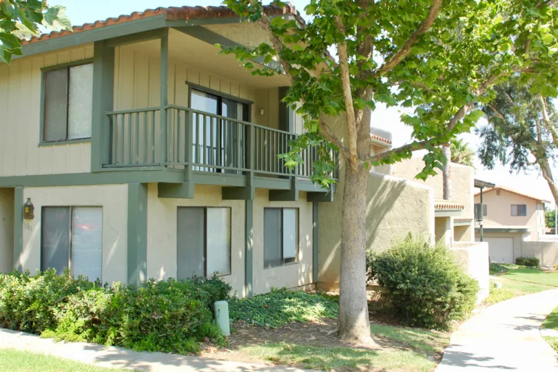 A summer day in the Village Grove Townhomes with balcony