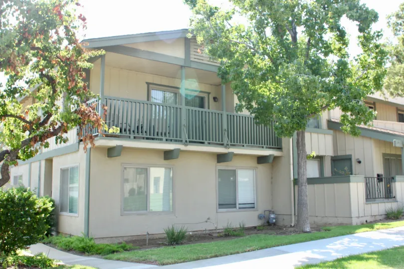 A HOUSE IN VILLAGE GROVE TOWNHOMES IN CORONA CITY AT CALIFORNIA