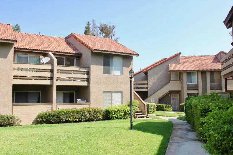 A satellite dish points up on a balcony in theWindwood community.
