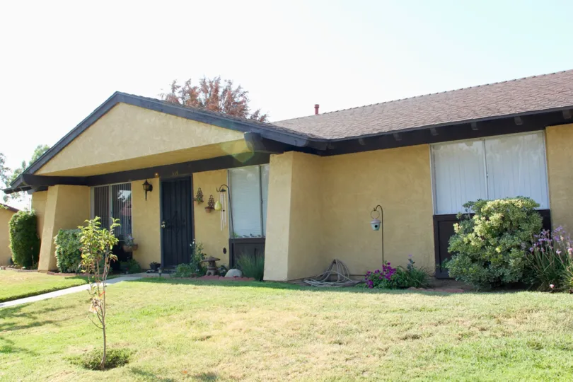 yellow walls, brown roofs of Pepper Tree Villas community, hemet, California