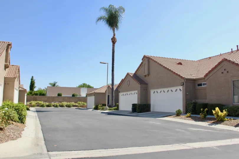 Traditional houses with brownish walls in Terra Linda Village