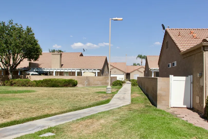 The Terra Linda Village with closed small white gate