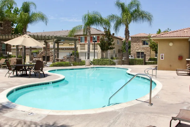 A public pool with covered seating in Brookview Terrace community.