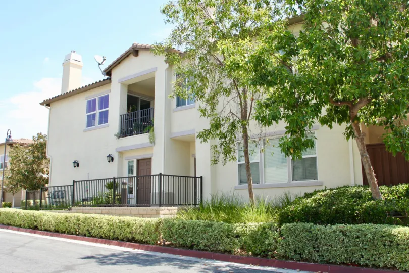 a flat road ends at vista del lago where people live and use their balconies