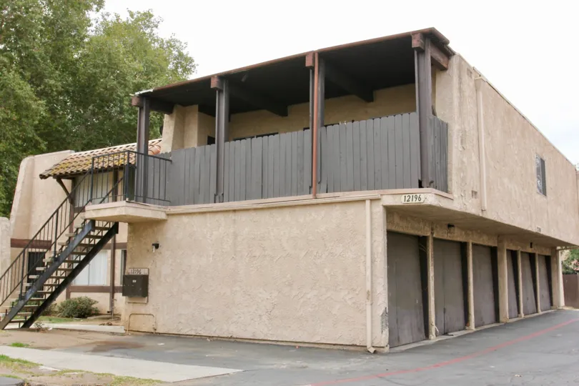 Spanish-style apartments with garage doors in Lakeview Sunnymead