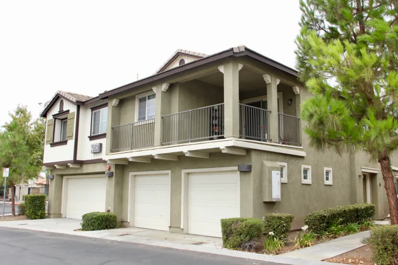 Front of Building showing Garage Doors in Palacio De Oro South in Moreno Valley California