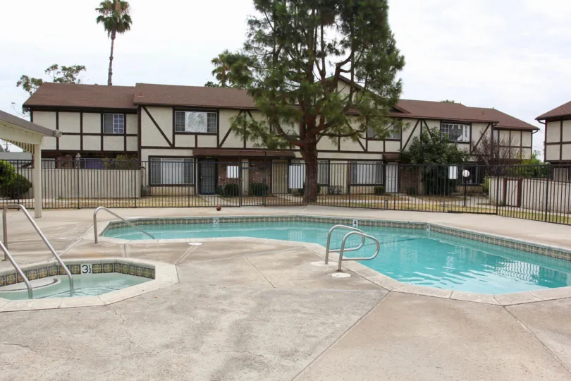 An adult and kid sized community pool at Woodland Villas